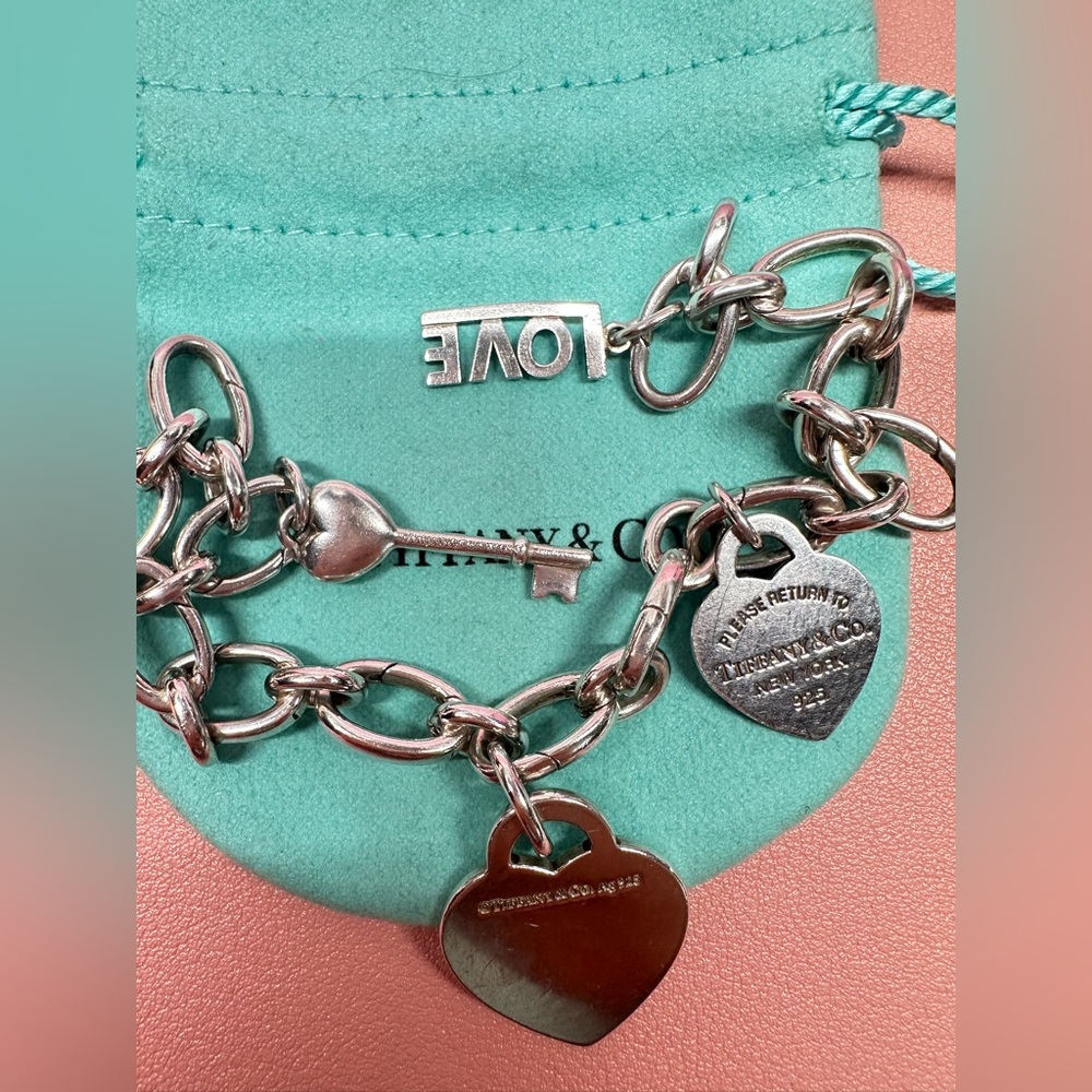 Tiffany authentic charm bracelet with charms.